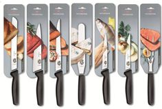 six knives with different images of fish and vegetables on them, all lined up in a row