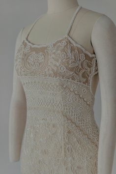 An old Hollywood inspired, full beaded dress in a vintage creamy tone.  DETAILS *Beaded straps that lead to a criss cross, open back. *Intricately beaded patterns and details on the full dress. SIZE GUIDE https://www.elyntang.com/size-guide PROCESSING TIME Please allow 1 to 2 weeks for your order to be shipped out. CUSTOMIZATION We allow customization in terms of size, colour, fabric and embellishment with the same dress pattern or a completely custom design. You may approach us with your ideas Art Deco Dress, Full Dress, Beaded Dress, Sheath Dress, Dress Pattern, Old Hollywood, Wedding Dresses Lace, White Dress, Custom Design