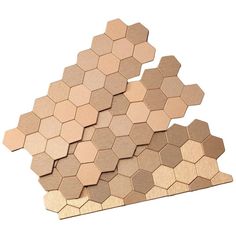 several wooden hexagons stacked on top of each other