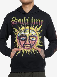 The Sublime sun logo will never go out of style! This hoodie's got a jumbo version of it on the front  plus a kangaroo pocket and drawstring hood.50% cotton; 50% polyesterWash cold; dry lowImportedListed in men'sunisex sizesModel is 6'1"Model wears size Medium Summer Cotton Hoodie With Drawstring Hood, Summer Cotton Hoodie With Drawstring, Summer Hoodie With Drawstring Hood, Summer Streetwear Graphic Print Hoodie, Summer Graphic Print Hooded Sweatshirt, Summer Hooded Sweatshirt With Graphic Print, Summer Hooded Graphic Print Sweatshirt, Cotton Hoodie For Summer Streetwear, Summer Cotton Hoodie For Streetwear