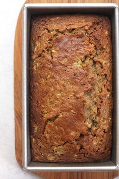 a loaf of banana bread in a metal pan