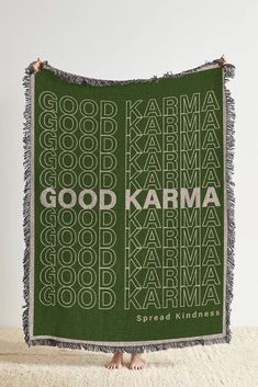 a blanket with the words good karma printed on it