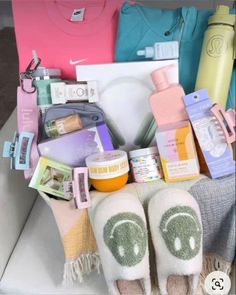 the contents of a woman's personal care kit are neatly arranged in a basket