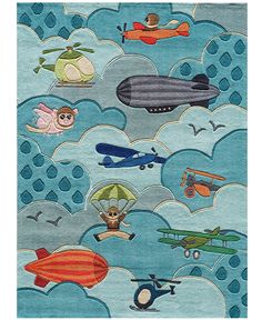 an area rug with airplanes, planes and other things in the sky on blue background