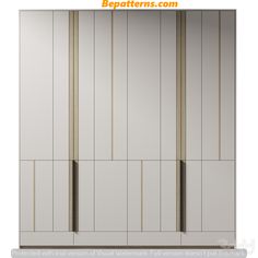 an image of some white cupboards with gold bars on the doors and bottom handles