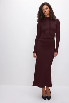 Designed to exude confidence, the Ribbed Funnel Neck Midi Dress is a dress worth making plans for. With a long sleeve funnel neck cut and ruching detail along the waist, designed to define your figure and flatter every curve, you will definitely be turning heads in this dress. It is made with the softest fabric that you'll never want to take off. Pair with your favorite heels to finish off the look. Midi length Soft and stretchy fabric Waist ruching detail Long sleeve Funnel neck Burgundy color High Neck Long Sleeve Dress For Fall, Bodycon Long Sleeve Ruched Maxi Dress, Winter High Neck Stretch Long Sleeve Dress, High Neck Ruched Dress For Fall, Ribbed Turtleneck Midi Dress For Fall, Chic Ruched Midi Dress For Fall, Ribbed Bodycon Long Sleeve Midi Dress, Ribbed Long Sleeve Dress For Fall, Stretch Ribbed Long Sleeve Dress