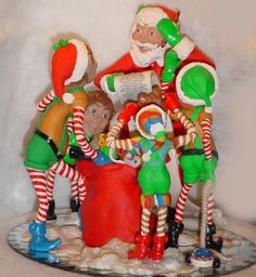 a group of elf figurines standing next to each other