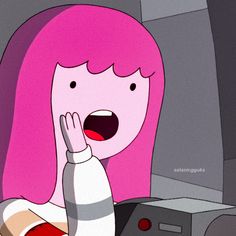 a woman with pink hair is making a face and holding her hand up to her mouth