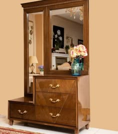 a dresser and mirror in a room