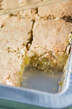 a close up of a cake in a pan with one slice cut out and ready to be eaten