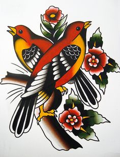 two birds sitting on top of each other next to flowers