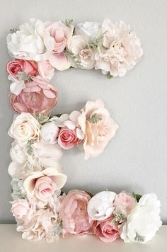 the letter e is made up of flowers