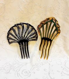 Antique Jeweled Hair Combs Mantilla Green Jewels 1920s Celluloid Vintage Vanity Art Deco Boudoir. Here are two antique rhinestone hair combs dating from the 1920s period. One is black celluloid and studded with white stones. The other is amber and black celluloid, studded with green stones and has a pierced outer edge. The black comb measures 5.5" long x 4.75" wide. The amber comb measures 6.5" long x 3.5" wide. I do not think it is missing stones. There are some wears of missing stones and othe Jeweled Hair Comb, Jeweled Hair, Vanity Art, Rhinestone Hair Comb, White Stones, Green Stones, Rhinestone Hair, Hair Combs, Vintage Vanity