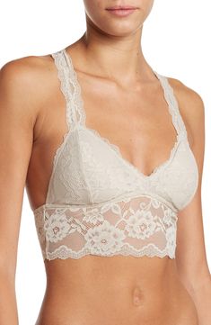 A sultry floral lace bralette with a back cutout offers a sophisticated style that can be worn as bold standout piece or a supportive underwear. V-neck Shell: 86% rayon, 14% spandex; lining: 95% polyester, 5% spandex Hand wash, dry flat Imported Spring Lace Bra With Lace Closure, Lace Bra With Lace Closure For Spring, Lace Bra For Spring, Chic Lace Bra With Lace Trim, Spring Chic Lace Bra, Chic Spring Lace Bra, Elegant Low-cut Bra For Spring, Elegant Low-cut Spring Bra, Elegant Spring Low-cut Bra