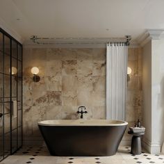 a bathroom with a black and white bathtub next to a shower curtain on the wall