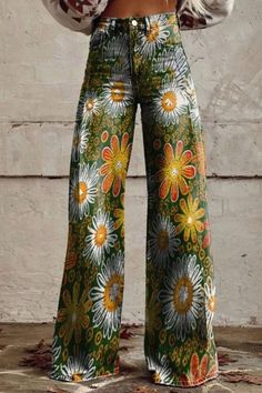 Elevate your style with these Women's Vintage Flower Daisy Print Wide Leg Jeans. The charming daisy pattern adds a touch of nostalgia to your outfit, while the wide leg design offers comfort and versatility. Perfect for casual outings or relaxed days, these jeans are a timeless addition to your wardrobe. Multicolor Floral Print Pants For Spring, Spring Floral Print Wide Leg Bottoms, Green Full Length Pants For Spring, Spring Full Length Green Pants, Green Cotton Bottoms With Floral Print, Casual Green Printed Bottoms, Green High Waist Printed Bottoms, Relaxed Fit Floral Print Bottoms For Spring, Retro Printed Bottoms For Spring