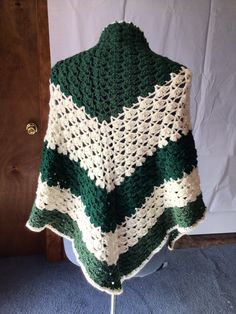 This is a very soft and warm handmade crocheted shawl . It's made with different shades of a dark green with a creamy white yarn in between. I can make this in any color or size also. Green Crochet Shawl For Winter, One Size Green Crochet Shawl, Green Hand Knitted Shawl For Winter, Handmade Green Shawl For Winter, Shades Of Dark Green, Crocheted Shawl, Green Crochet, Crochet Shawl, Creamy White