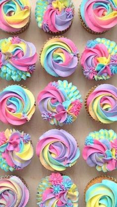 cupcakes with different colored frosting on them