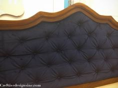 an upholstered headboard made to look like a bed