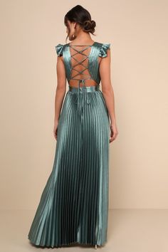 You're sure to be greeted with compliments from every direction when you arrive wearing the Lulus Exceptional Drama Sage Green Satin Lace-Up Pleated Maxi Dress! Sleek woven satin, with luxe accordion pleats throughout, shapes a sleeveless bodice with ruffled shoulders, a plunging V-neckline, and a stunning lace-up back. Fitted waist tops a flaring skirt that ends at a maxi hem. Hidden zipper/clasp at back. Fit: This garment fits true to size. Length: Floor length. Size medium measures 60.25" from shoulder to hem. Bust: Great for any cup size. Waist: Fitted - very fitted at natural waist. Hip: Not Fitted - fuller skirt allows room for hips. Undergarments: May be worn with an adhesive bra, petals, or no bra. Fabric: Fabric has no stretch. Lined. Shell: 95% Polyester, 5% Spandex. Lining: 100% Sage Green Maxi Dress, Accordion Pleats, Lulu Fashion, Dress Pleated, Adhesive Bra, Pleated Maxi Dress, Pleated Maxi, Guest Dress, Green Satin