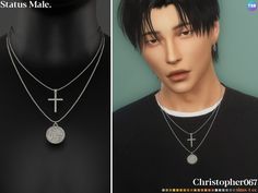 two necklaces with cross pendants are shown on mannequin head, and one is wearing a black t - shirt