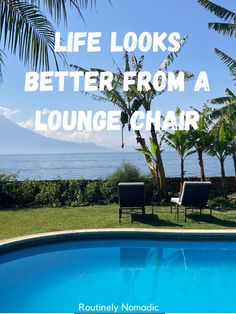 a pool with chairs and palm trees next to the ocean, text reads life looks better from a lounge chair