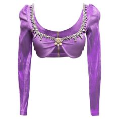 Purple long sleeve embellished bra top by Miss Sohee. Scoop neckline featuring crystal embellishments. Zip closure at center back. 28" bust, 17" shoulder width, 12.5" length. Embellished Bra, Miss Sohee, Purple Long Sleeve, Crystal Embellishment, Bra Top, Aesthetic Outfits, Bra Tops, Scoop Neckline, Shirt Blouses