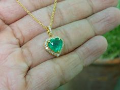 Heart-shaped Emerald Necklaces For Anniversary, Heart-shaped Emerald Necklace For Anniversary, Anniversary Heart-shaped Emerald Necklace, Emerald Heart Cut Necklace For Anniversary, Heart Cut Emerald Necklace For Anniversary, Heart-shaped Diamond Jewelry For May Birthstone, Gold Emerald Heart Cut Jewelry, Emerald Wedding Jewelry For Valentine's Day, Emerald Jewelry For Anniversary On Valentine's Day