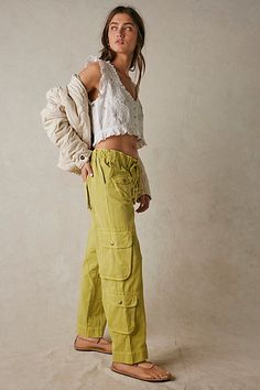 The coolest way to cargo, these timeless pants are featured in a low-rise, slouchy straight silhouette with utility-style pockets throughout and smocked waist for ease. * Zip fly and button closure * Drawstring waist feature * Oversized pockets throughout * Ankle-length | Tahiti Cargo Pants by Free People in Green, Size: L Utility Outfit, Summer Outfits Y2k, Outfits Athletic, Y2k Summer Outfits, Summer Outfits Women Over 40, Plus Size Summer Outfits, Modest Summer Outfits, Cargo Pants Outfit, Outfits Y2k