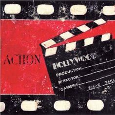 an old movie clapper with the words action on it