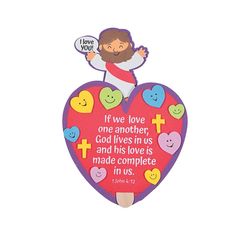 a heart shaped magnet with the words if we love one another, god lives in us and his love is made complete in us