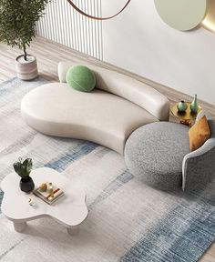 a living room filled with furniture on top of a rug