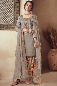 A stylish interpretation of ethnic glamour and contemporary style, this Warm Grey Cotton Patiala Suit which will surely grabs everyone attention. This U neck and Quarter Sleeves Wedding Wear Dress perfectly formed using resham, zari and stone work. Teamed up with Cotton Patiala Salwar in Warm Grey Color with Warm Grey Chiffon Dupatta Cotton Sharara, Pakistan Dress, Desi Outfits, Resham Work