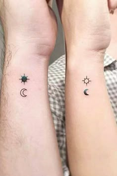 two people with matching tattoos on their arms