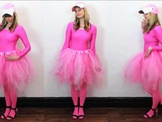 a woman in pink is standing next to a white wall and wearing a pink costume