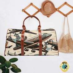 Get ready to jet set in style with our Mid Century Modern Travel Bag! Inspired by the retro airplanes of the 50s, this bag features a playful print of atomic boomerang kitties. Perfect for weekend getaways or under the seat travel. Don't forget to pack this quirky and fun bag! This chic travel bag blends functionality with fashion. Crafted from premium waterproof nylon, it offers robust durability for transporting your necessities. Designed with several pockets, a sturdy top handle, and a modifi Overnight Travel Bag, Weekend Travel, 50s Style, Overnight Bags, The 50s, Nesting Tables, 50s Fashion, Overnight Bag, Weekend Trips