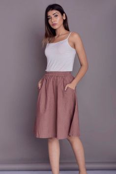 "Midi Linen Skirt, Skirt with Pockets, Linen skirt for women, Knee Length skirt, Plus size skirt - Custom made by Modernmoveboutique >DESCRIPTION< - Length of the skirt - 24\" (61 cm) - If you want to customize the length, please mention in 'Note to seller' section while ordering the skirt. - standard fit. - made from Linen blend. The fabric is of medium weight (185 g). - the model is 172 cm high (regular XS - S) and is wearing size S. - color in the picture - DUSTY ROSE - (Please choose c Long Linen Skirt, Beach Maxi Skirt, Casual Linen Pants, Plus Size Skirt, Skirt Plus Size, Plus Size Party Dresses, Button Skirt, Linen Casual, Skirt For Women