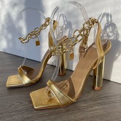 Locked In Cute Gold Chunky Heel Gold Square Toe Heels For Party, Gold Heels With Square Toe For Party, Party Heels With Chain Strap And Square Toe, Square Toe Heels With Chain Strap For Party, Gold Chunky Heels, Tan Block Heels, Strap Sandals Heels, Tie Heels, Jimmy Choo Romy