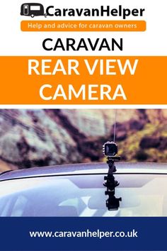 a car with the words caravan rear view camera on it's windshield and an orange background