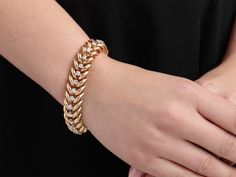 Composed of 28 triangular links in yellow gold, each accented by a single prong-set diamond in white gold, all in 18k. Jewellery Marketing, Bracelets Gold Diamond, Prong Setting, Diamond Bracelet, Gold Diamond, 18k Gold, White Gold, Gems, Yellow Gold