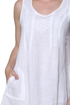 This sleeveless dress has beautiful handmade embroidery and it's a want for every women's wardrobe. It is crafted in 100% linen with a scoop neckline and side pockets Style: DressMaterial: 100% LinenNeck Style: ScoopSleeve Length: Sleeveless Care Instruction: Machine WashColors: WhiteModel Number: 2401 Casual Embroidered Linen Dress, White Sleeveless Linen Dress With Pockets, Embroidered Sleeveless Linen Dress, Sleeveless Linen Dress With Floral Embroidery, Embroidered Linen Dress For Vacation, Sleeveless Embroidered Linen Dress, Summer Linen Dress With Embroidered Hem, Womens Wardrobe, Handmade Embroidery