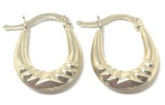 These 14k yellow gold oval hoop earrings are the perfect minimalist accessory. Wearable with anything, yet unique enough to be noticed, these oval hoops are the definition of modern and graceful. At just over under inch in height, these small sized hoops will make a subtle but lasting impression. Their simple yet stylish shape is sure to be in style for years to come. Available in a variety of styles, we are sure to have the unique oval hoops for you! Available in Classic, Twisted, Twisted Diamo Small Shrimp, Oval Hoop Earrings, Minimalist Accessories, Gold Hoop, Gold Hoop Earrings, Diamond Cuts, Gold Bracelet, Hoop Earrings, Twist