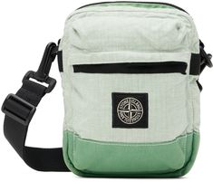 Abrasion-resistant polyurethane-coated linen-blend muslin and nylon canvas pouch in green. · Adjustable and detachable webbing crossbody strap · Zip pocket and logo patch at face · Logo-woven webbing strap at back face · Zip closure · Zip pocket at interior · Full poplin lining · H8 x W6 x D2.75 Supplier color: Light green Supplier code: 801590830 Island Clothing, Stone Island Clothing, Webbing Strap, Canvas Pouch, Stone Island, Everyday Carry, Crossbody Strap, Luxury Streetwear, Linen Blend