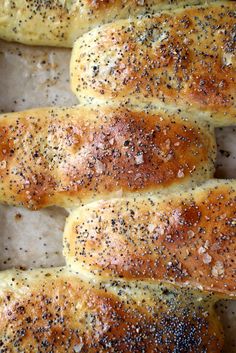 bread sticks covered in sesame seeds and seasoning