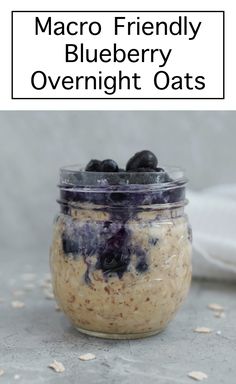 blueberry overnight oats in a glass jar with the words, macro friendly blueberry overnight