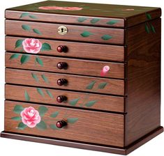 a wooden chest with flowers painted on it