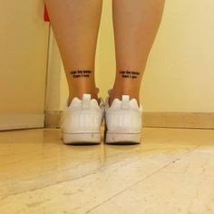 a woman's legs with small tattoos on them and the words don't make me do it