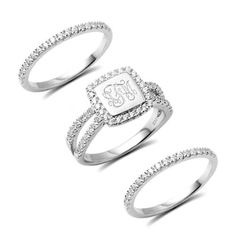 two rings with the initials on them and one has diamonds in each band, while the other