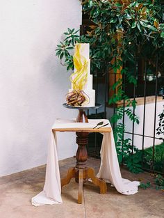 a small table with a cake on it