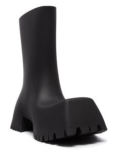 Black rubber Trooper block-heel rubber boots from BALENCIAGA featuring pull-on style, square toe, calf-length, ridged rubber sole and block heel. This item is in size 39 and the color is Black Classic Black Boots, Cristobal Balenciaga, Balenciaga Boots, Black Boots Men, Balenciaga Mens, Spanish Fashion, Leather Cap, Rubber Boots, Mens Gloves